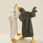 Silly Goose PJs black and white matching goose wearable blankets Can couples wear Silly Goose PJs? Matching black and white adult goose onesie wearable blankets for cozy gift ideas.