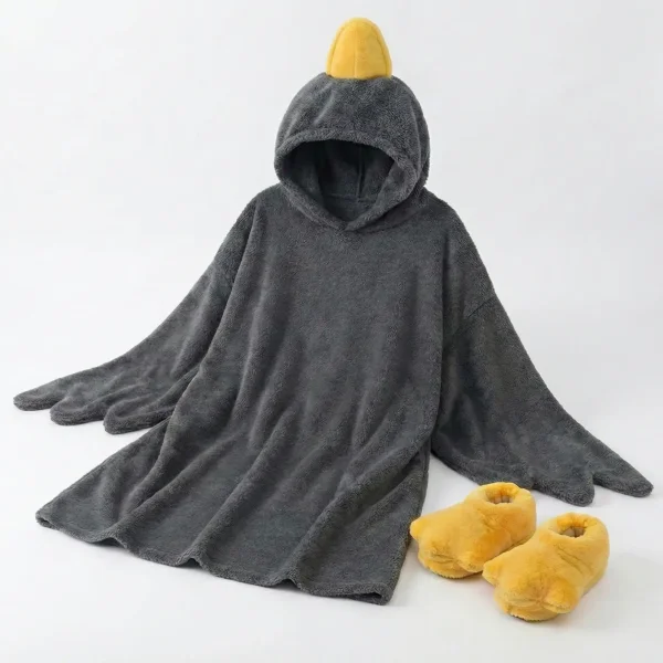 What comes with Silly Goose PJs? Black goose hooded wearable blanket and matching yellow goose slippers flat lay.